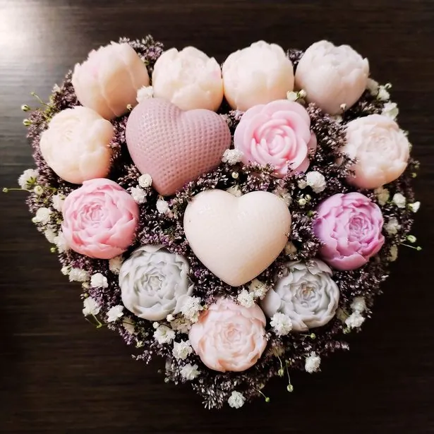 Heart arrangement of flower-shaped soaps