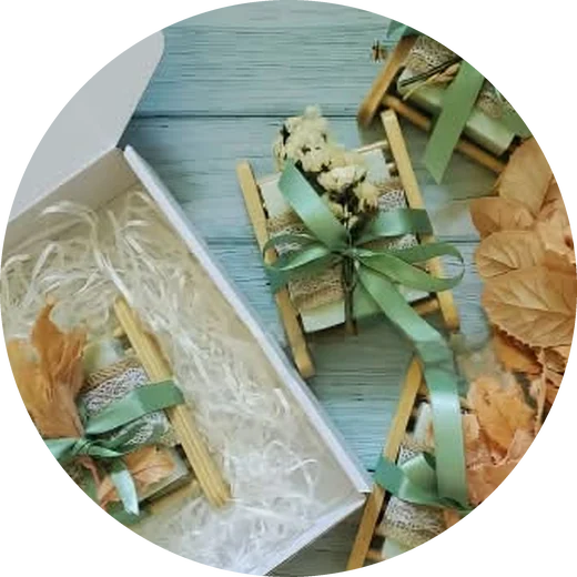 Artisan soaps on bamboo dishes tied with sage ribbon